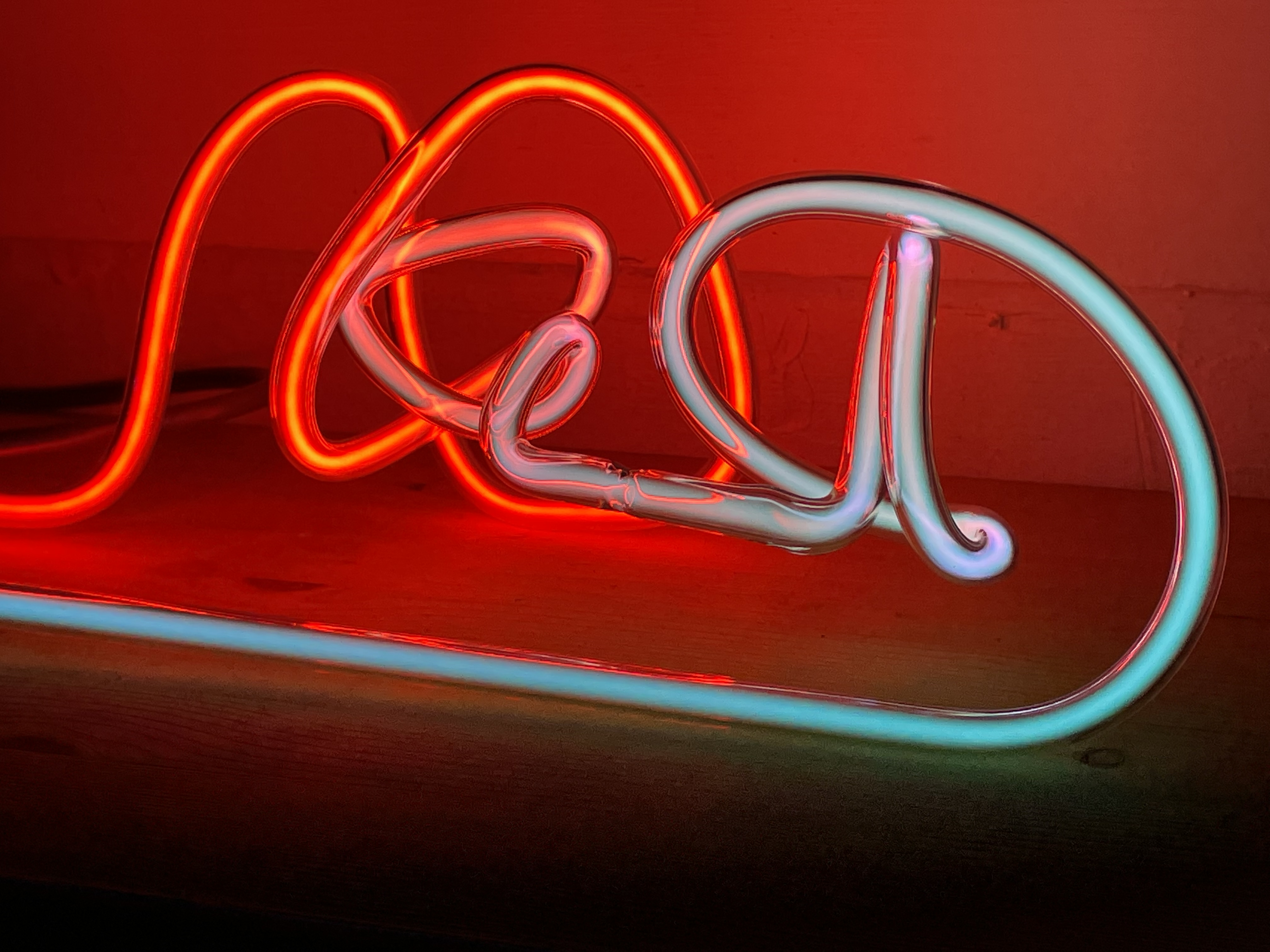 image of blue and red neon sculpture